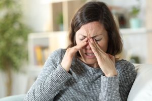 middle-aged-woman-with-sinus-headache